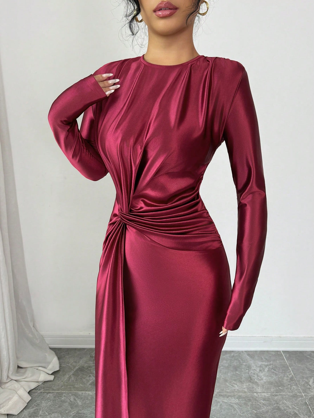 Elevate your autumn wardrobe with this stunning maxi dress that effortlessly blends sophistication with modern flair. Featuring an eye-catching twist design at the bodice and a gracefully pleated hem, this piece transitions seamlessly from daytime gatherings to evening celebrations. The flowing silhouette flatters every figure while the thoughtful construction ensures all-day comfort. Perfect for weddings, cocktail parties, or any occasion calling for polished elegance. Slip into timeless style that makes a