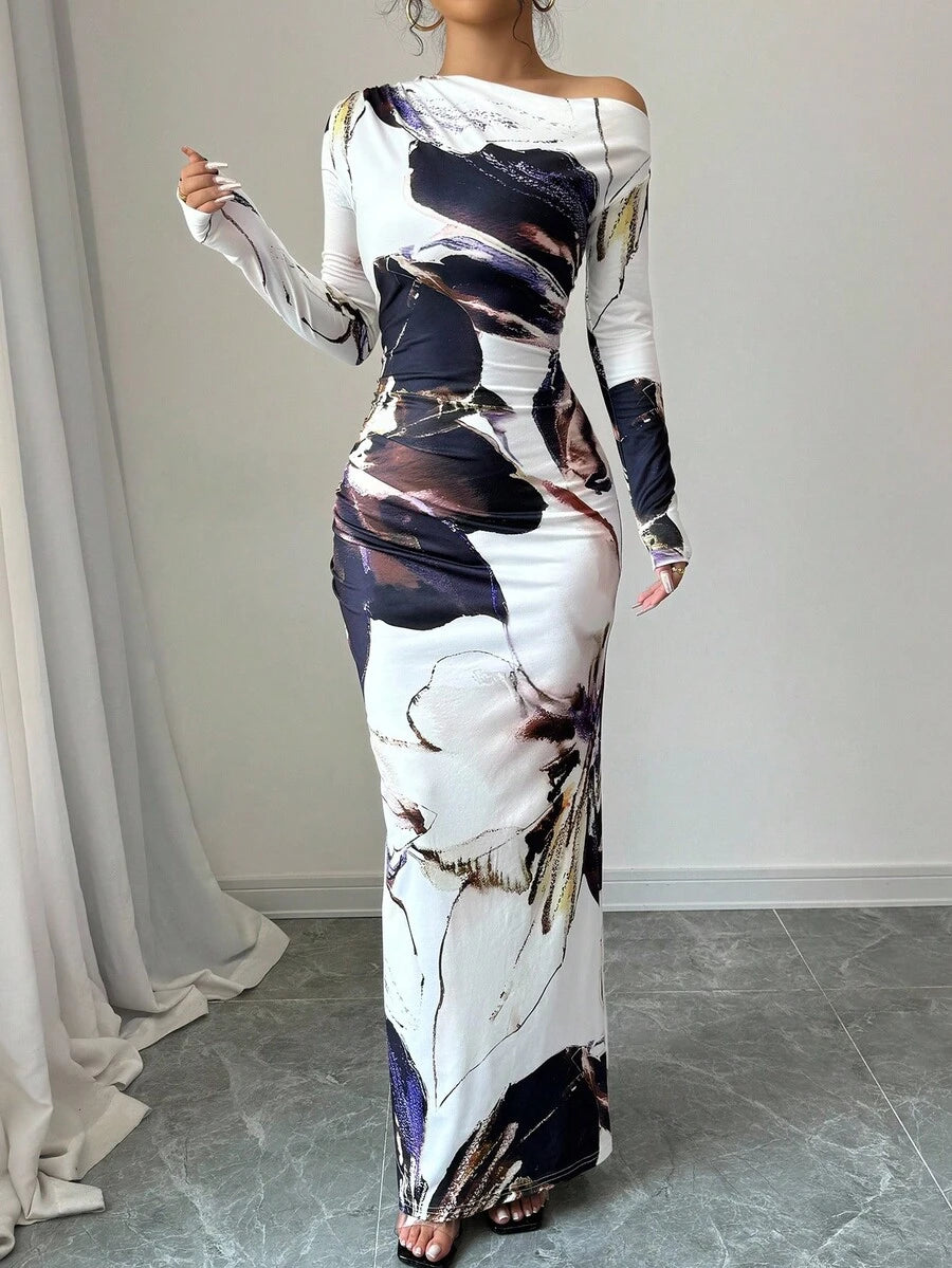 Elevate your everyday wardrobe with this stunning maxi dress that effortlessly blends sophistication and fun. The asymmetric neckline adds an unexpected twist, while long sleeves provide versatile coverage for any season. An allover print brings visual interest and personality, while the defined waist creates a flattering silhouette that moves beautifully with you. Perfect for brunch dates, casual outings, or whenever you want to feel put-together without trying too hard. This is the dress that does all the