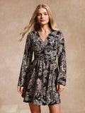 Effortlessly stylish (like you), this Chic Women's Paisley Print Long Sleeve V-Neck Short Dress is perfect for those who don't take themselves too seriously. Featuring a playful paisley print, flattering V-neck, and easy-to-wear long sleeves, this dress is the perfect addition to any wardrobe. Get ready to turn heads and make a statement without even trying. (And trust us, you'll rock this dress effortlessly.)