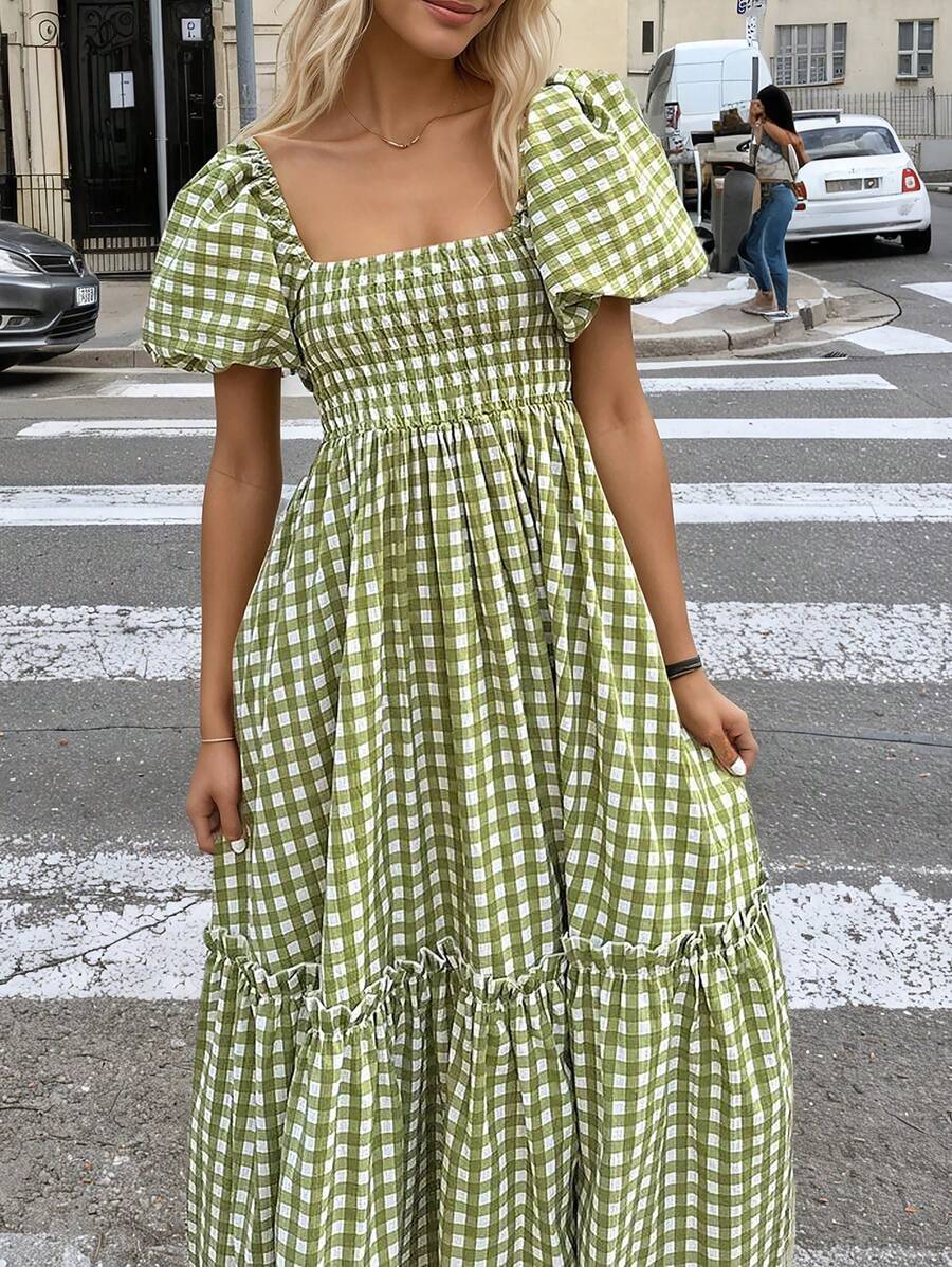 Front close view green white gingham smocked dress with puff sleeves and tiered ruffle skirt