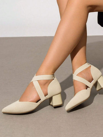 Elevate your everyday style with these sophisticated pointed-toe chunky heels. Featuring a chic knitted design with a secure ankle strap, these mid-heel pumps deliver comfort without compromising elegance. The criss-cross detailing adds visual interest, while the sturdy chunky heel provides stability for all-day wear. Perfect for the office, special occasions, or holiday celebrations, these versatile apricot heels transition seamlessly from professional settings to festive gatherings. A timeless addition to