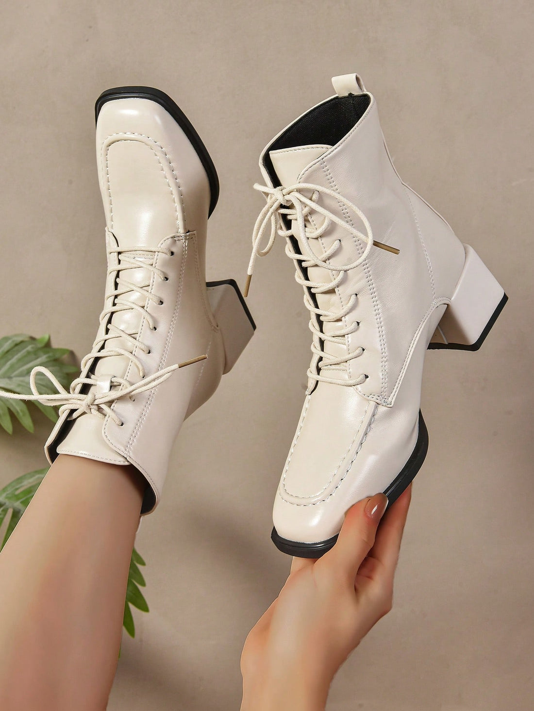 Effortlessly stylish and chic, these mid-calf boots feature a trendy pointed toe and lace-up design that will elevate any outfit. The perfect addition to any wardrobe, these boots offer both fashion and comfort for a unique look. Say goodbye to boring boots and hello to effortless style!