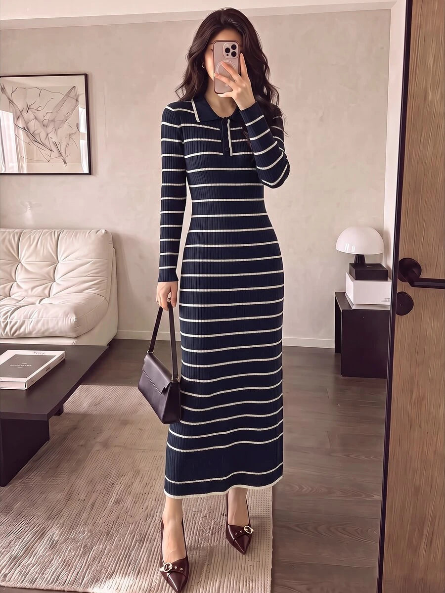 Full front view of navy and ivory striped rib-knit polo sweater dress styled with heels indoors