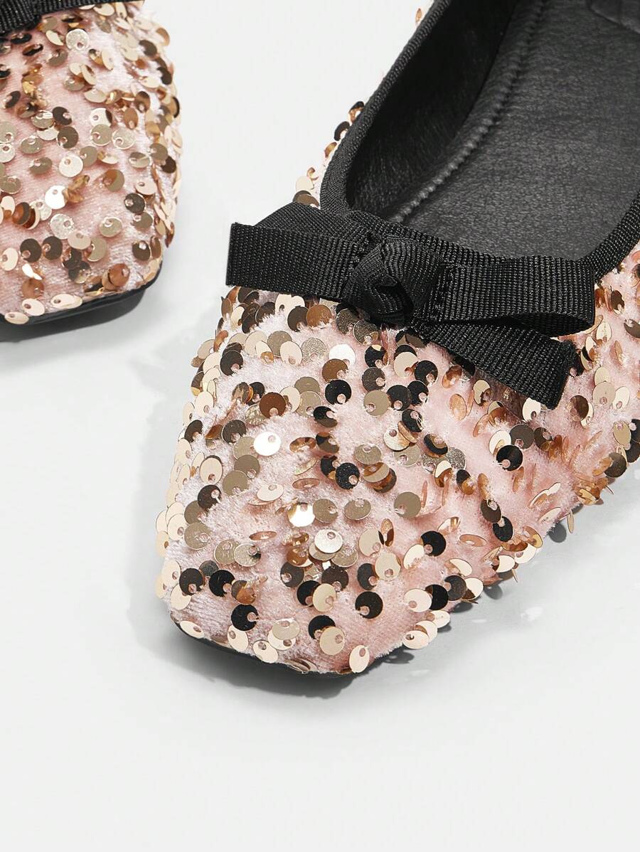 Step into effortless elegance with these sequin bow-embellished flat shoes, designed for the modern woman who values both style and comfort. The shimmering sequin detailing catches light beautifully, while the charming bow accent adds a touch of feminine sophistication. Perfect for spring celebrations, Easter gatherings, or everyday wear, these flats transition seamlessly from casual outings to special occasions. The flat sole ensures all-day wearability without sacrificing glamour, making them an essential