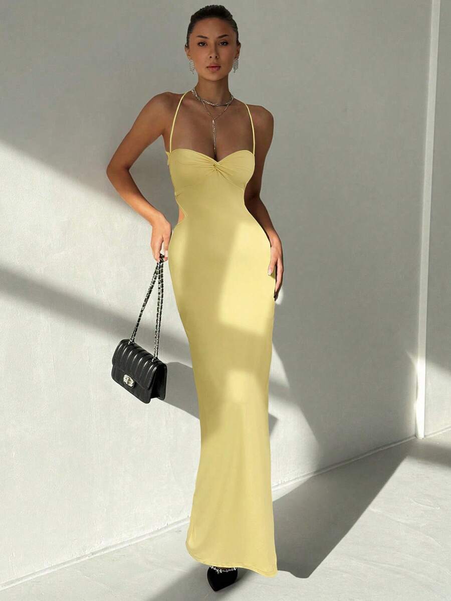 Turn heads at your next summer celebration in this chic cami dress that perfectly blends style and sass. The daring side cut-outs add an edgy twist, while the cinched waist creates a flattering silhouette that moves with you. Whether you're dancing at a festival or sipping cocktails at a rooftop party, this dress delivers effortless glamour with just the right amount of flirtation. Lightweight and breathable, it's your go-to piece for making a statement when the temperature rises.