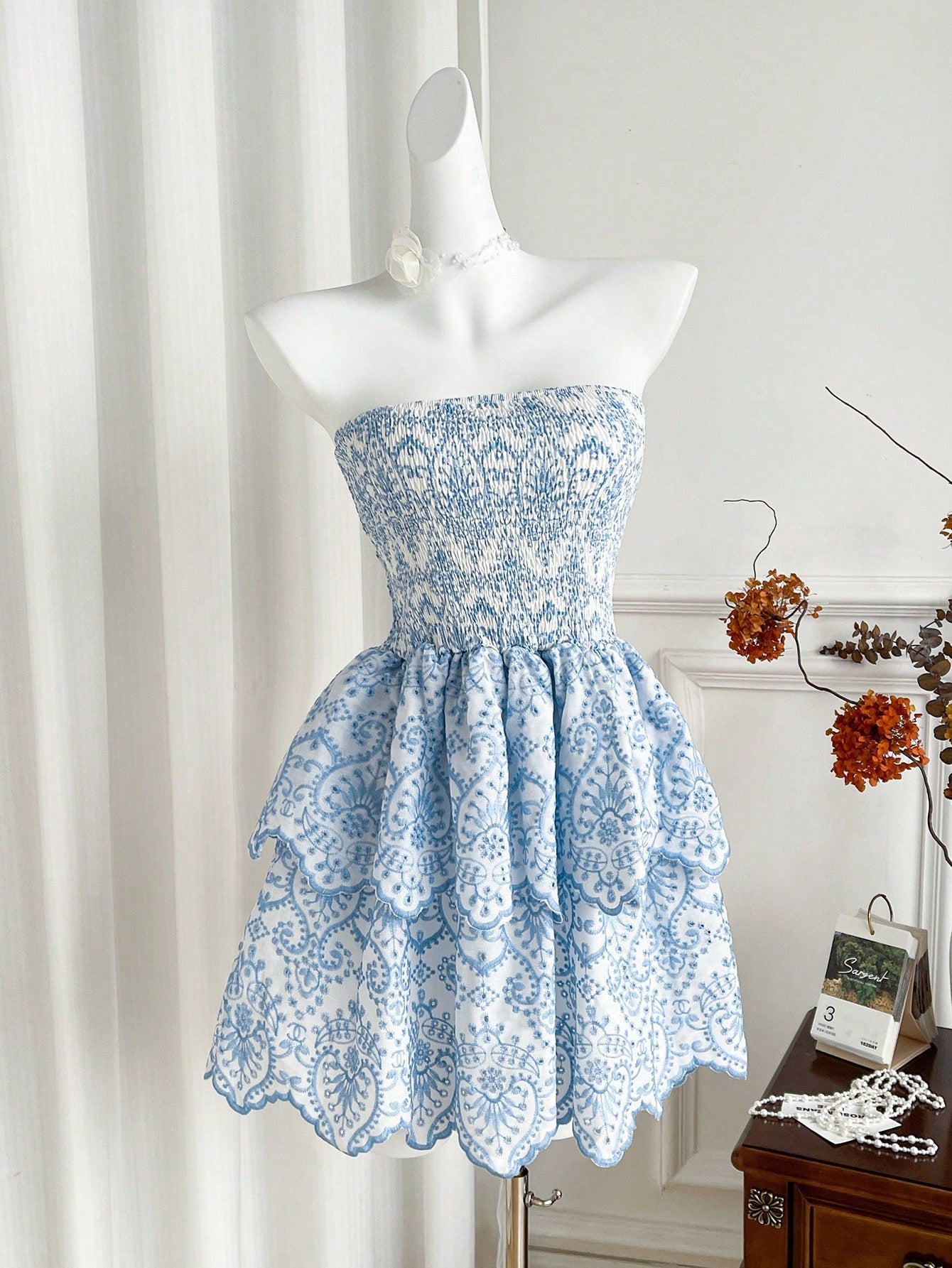 Turn heads on your next getaway with this playful sleeveless mini dress featuring open shoulders and vibrant embroidered patchwork. Its breezy design keeps you cool while adding a splash of color and charm, perfect for beach strolls or sunset dinners. Embrace effortless vacation style that’s as fun as your adventures.