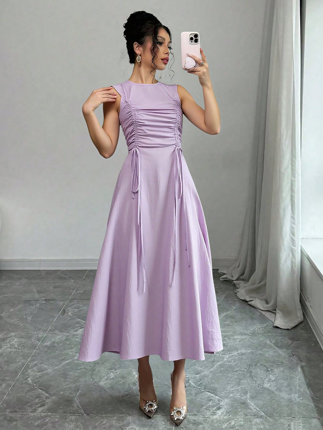 Effortlessly stylish and oh-so-chic, this sleeveless dress is a must-have for any fashion-forward woman. The ruched detailing and drawstring waist give this solid color dress a flattering silhouette, perfect for any occasion. Get ready to turn heads and make a statement with this versatile piece!