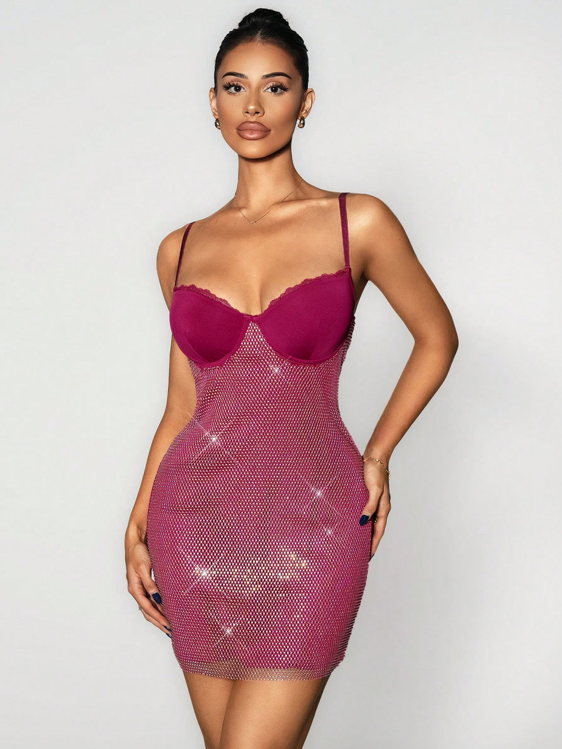 Elevate your everyday style with this stunning camisole dress that's equal parts sophisticated and fun. The sleek slim fit flatters your silhouette while delicate contrast lace adds an unexpected touch of elegance. Sparkling rhinestone details catch the light beautifully, making this piece perfect for date nights, brunch outings, or whenever you want to feel fabulous. Versatile enough to dress up or down, this chic number is about to become your go-to favorite.
