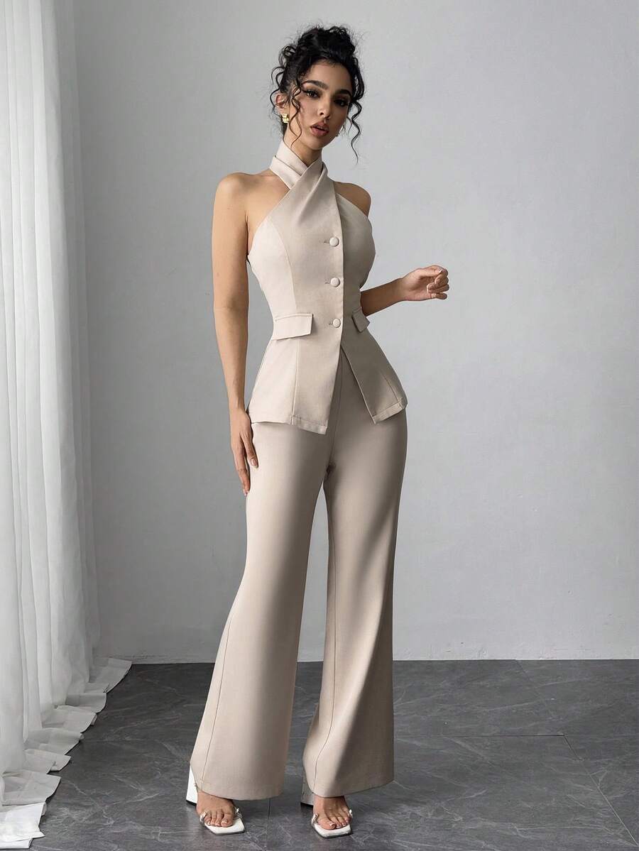 Elevate your wardrobe with this sophisticated 2-piece set featuring a sleek halter camisole and flowing flare pants. The backless halter top offers a modern, elegant silhouette perfect for office settings or special occasions, while the high-waisted flare pants provide a flattering, timeless look. Crafted from a comfortable 95% polyester and 5% elastane blend, this set moves with you throughout your day. The neutral apricot tone pairs effortlessly with accessories for versatile styling.