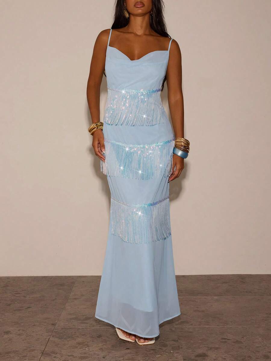 4 media show light baby blue spaghetti strap cowl neck maxi dress with sheer overlay, tiered iridescent fringe, fitted body, open back zipper, floor length, formal evening party identity. image 1