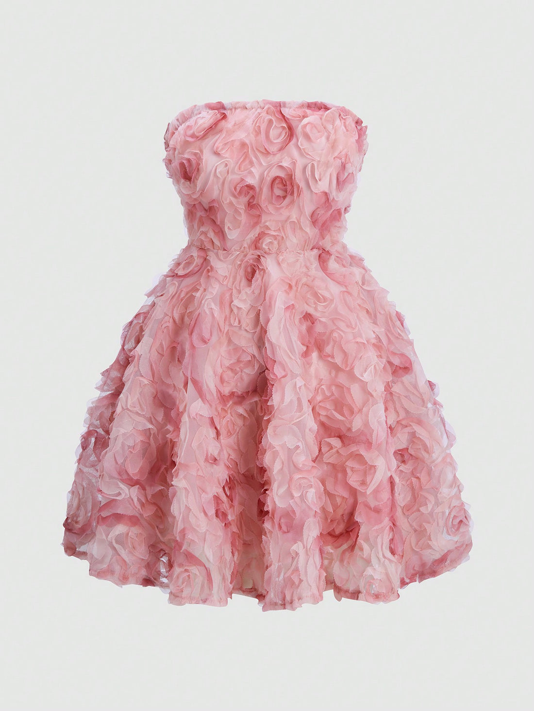 Turn heads in this playful strapless mini dress adorned with charming 3D flower appliqués. Perfect for stylish outings, its flattering cut and eye-catching details bring a fun, flirty vibe to your wardrobe. Embrace effortless elegance and let your confidence bloom wherever you go!