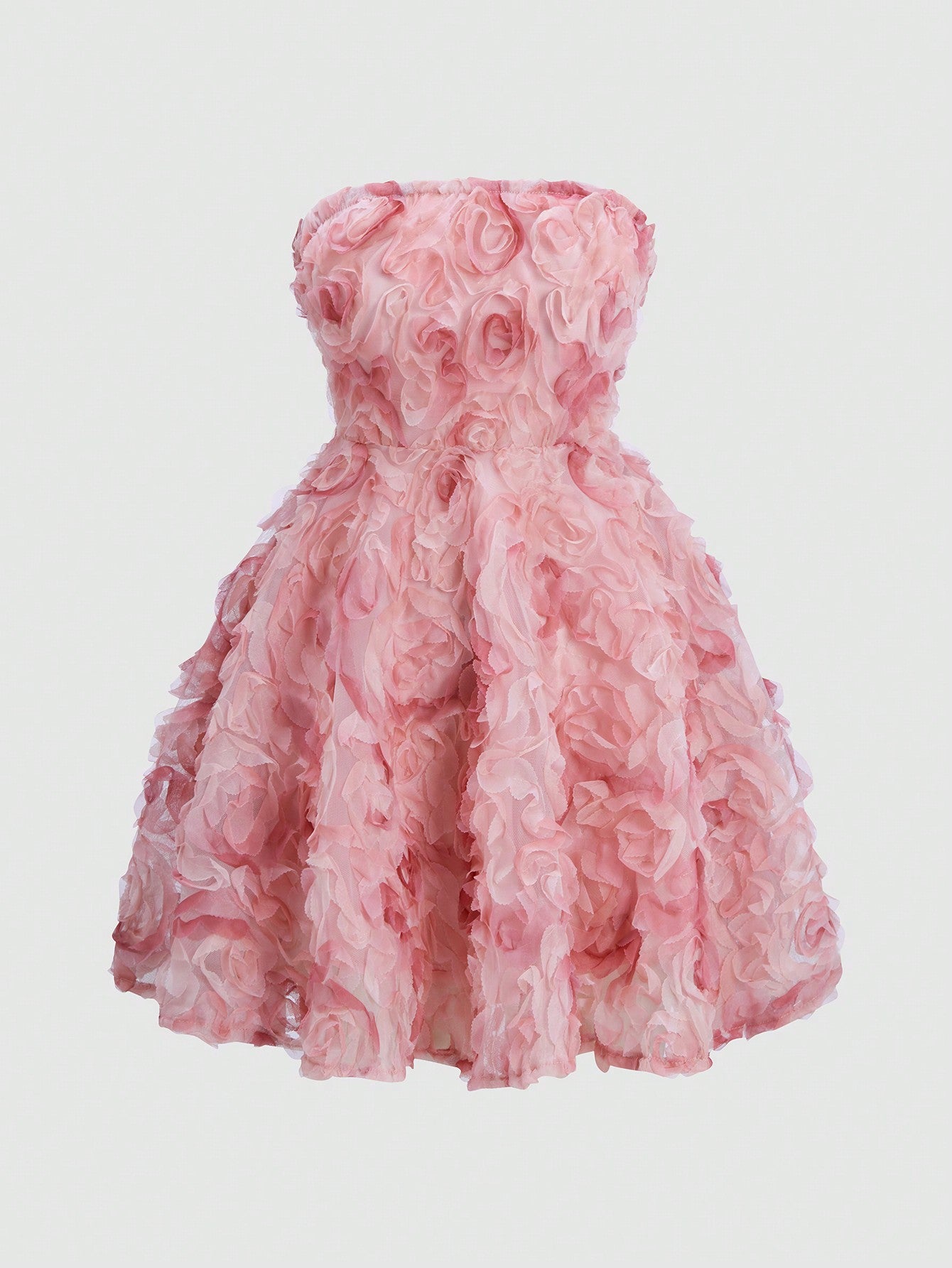 Turn heads in this playful strapless mini dress adorned with charming 3D flower appliqués. Perfect for stylish outings, its flattering cut and eye-catching details bring a fun, flirty vibe to your wardrobe. Embrace effortless elegance and let your confidence bloom wherever you go!