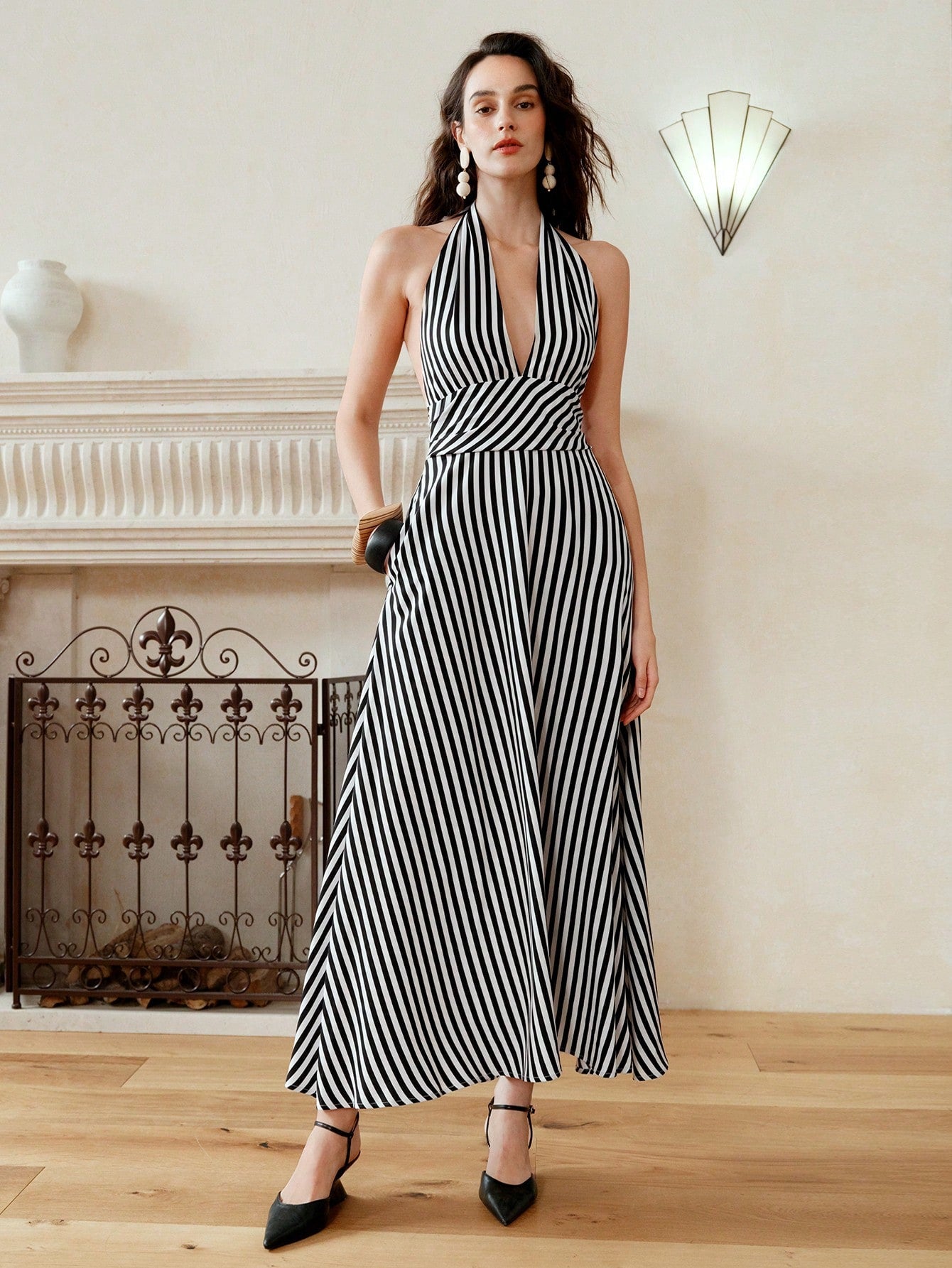 Effortless elegance, chic style, and playful charm all in one! This mid-length, striped woven dress is perfect for any occasion with its tie waist for a flattering fit. Own your style and turn heads wherever you go!