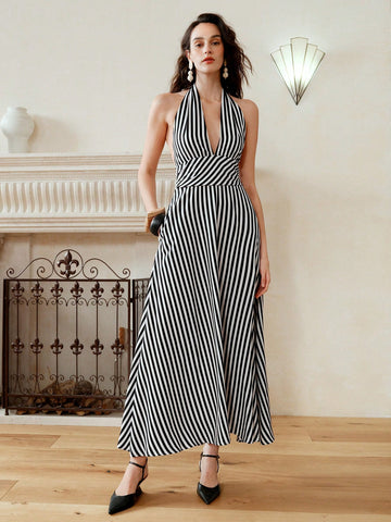 Effortless elegance, chic style, and playful charm all in one! This mid-length, striped woven dress is perfect for any occasion with its tie waist for a flattering fit. Own your style and turn heads wherever you go!