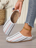 Step into fashion with these versatile round toe flats - the perfect balance between chic and playful. Slip-on effortlessly and rock the unique striped design, fringe, and buckle details. You'll be turning heads and keeping comfortable all day long.