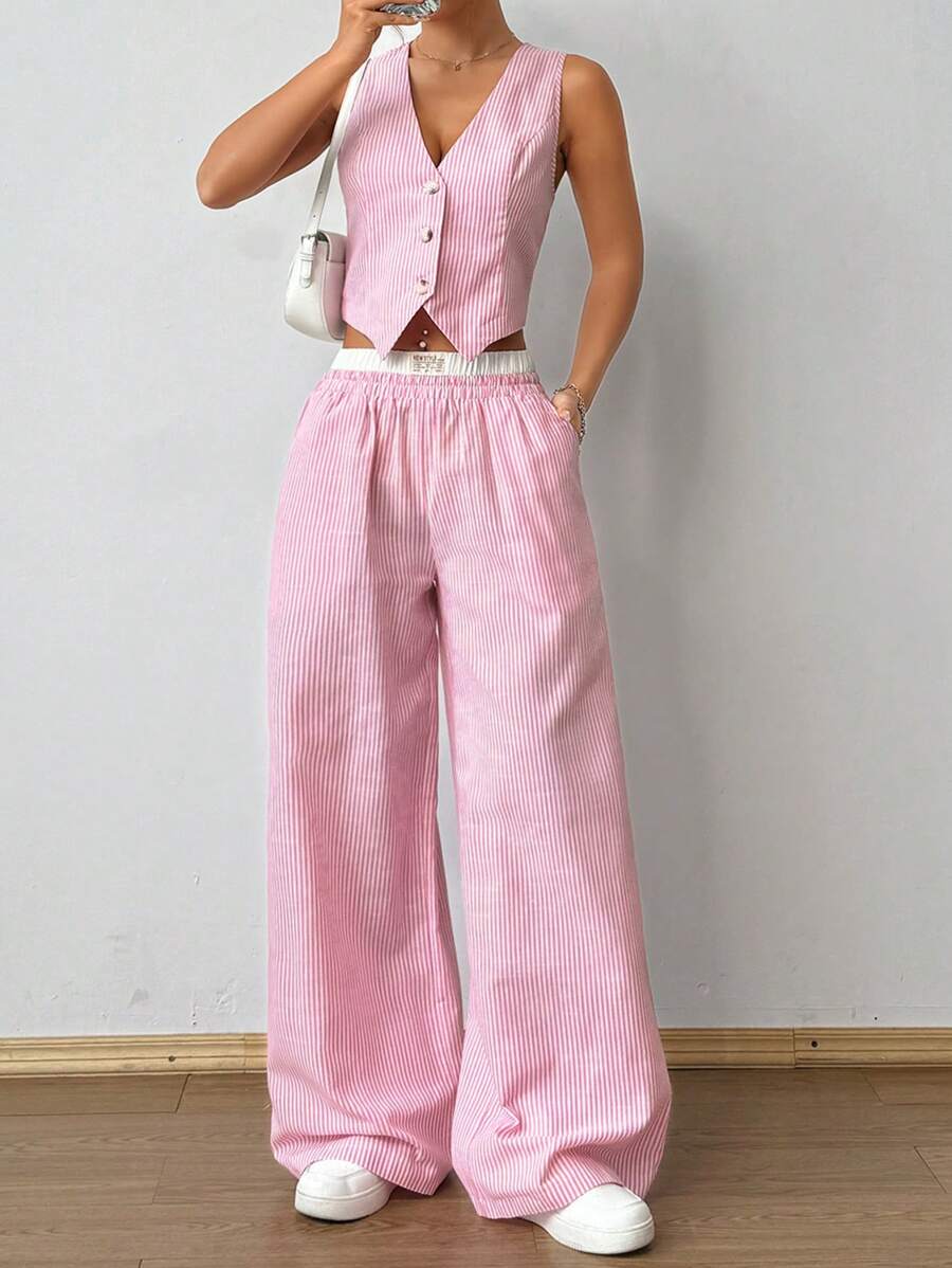 Effortlessly chic meets summer-ready with this dynamic two-piece set! The striped sleeveless top features a flattering V-neckline that's perfect for warm-weather styling, while the coordinating pants boast contrast pockets for that extra touch of personality. Mix, match, or wear together—this versatile duo transitions seamlessly from casual brunch to evening outings. Whether you're lounging poolside or heading out for adventure, you'll feel put-together and comfortable all season long.