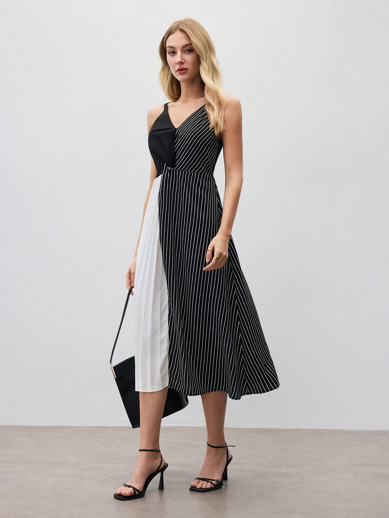 Turn heads this summer with our Chic Women's Summer Color Block Striped Pleated Hem Cami Dress! Featuring bold stripes and a flirty pleated hem, this lightweight dress keeps you cool and effortlessly stylish under the sun. Perfect for warm weather adventures or casual outings, its playful design adds a splash of fun to your wardrobe. Embrace comfort and vibrant charm in one easy, breezy look!