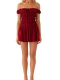 This chic mini dress is perfect for summer with its trendy off-shoulder design and fun cape sleeves. The solid color and playful polka dot pattern add a unique flair to any outfit. Stay stylish and cool in this must-have dress.