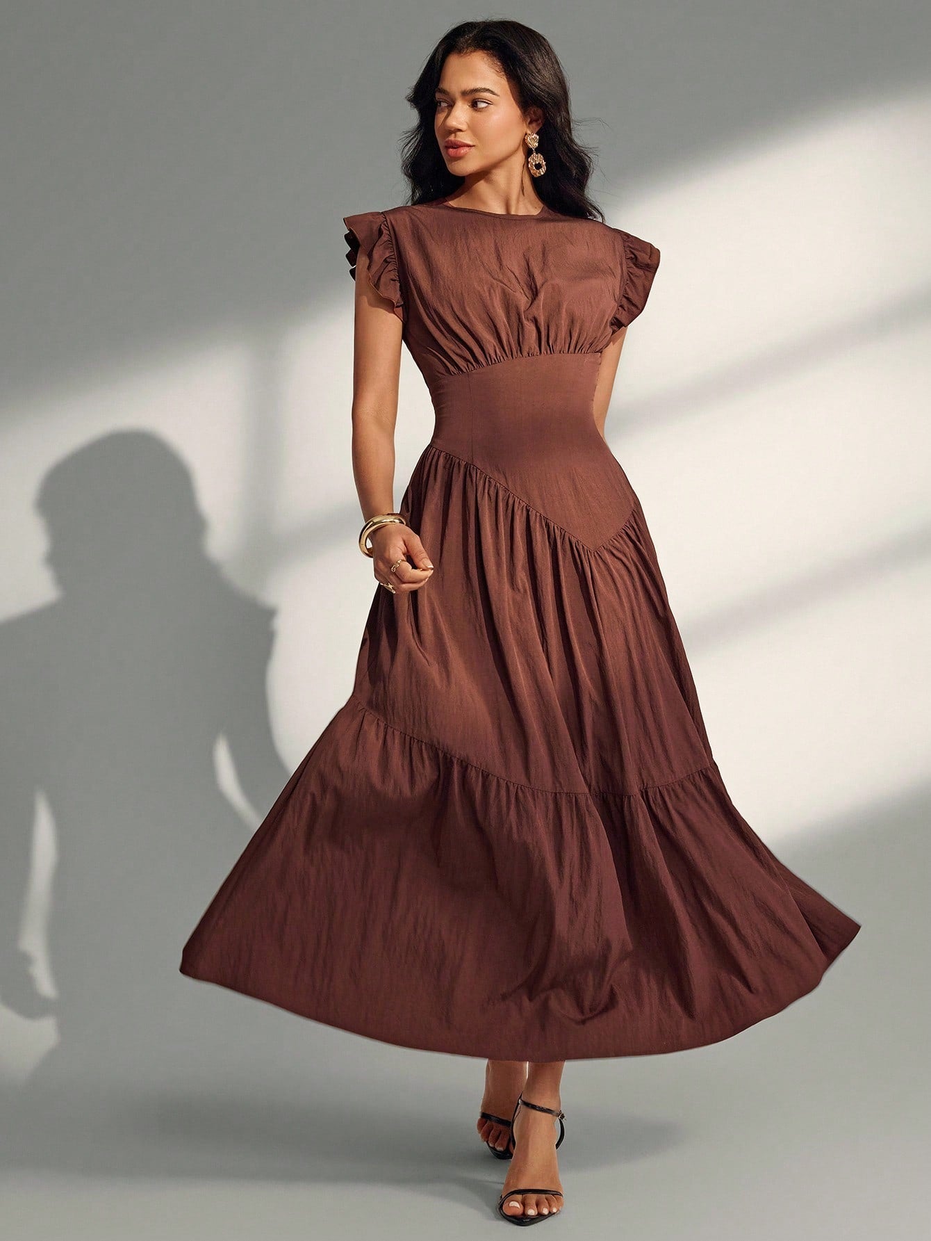 Step into style with this chic tiered ruffle hem dress, designed to bring a flirty bounce to your every move. The playful cap sleeves add a touch of charm, making it perfect for effortless daytime elegance or a fun night out. Embrace comfort and confidence wrapped in feminine layers that love to twirl. Perfect for those who adore a mix of sophistication and sweet whimsy.