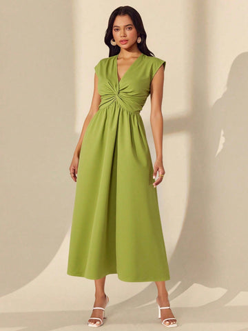 Elevate your summer wardrobe with this stunning V-neck dress that's equal parts chic and comfortable. The front twist detail adds a flirty touch of sophistication, while the flowing long silhouette keeps you cool and graceful through warm days. Perfect for brunch dates, casual outings, or whenever you want to look effortlessly put-together without trying too hard. Slip it on and let the dress do the talking—because looking this good should feel this easy.