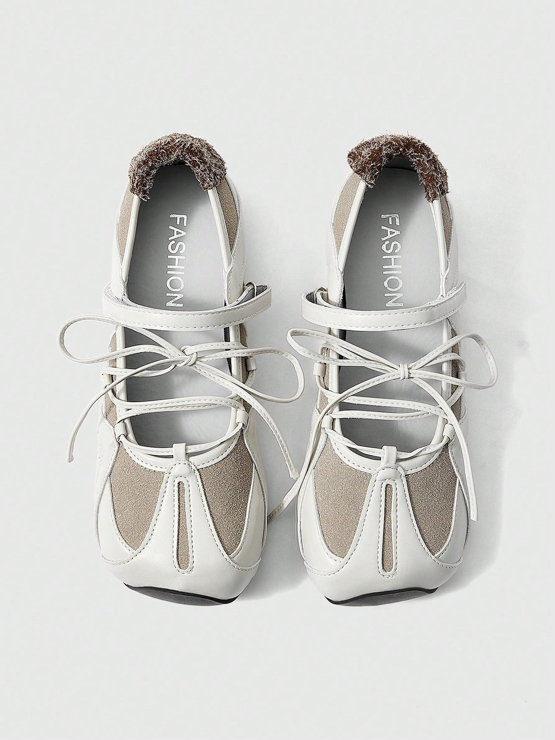 Elevate your everyday footwear with these versatile white ballet flats, engineered for both style and comfort. Featuring a refined lace-up design paired with a convenient slip-on construction, these flats deliver the best of both worlds—secure fit with effortless wearability. The subtle platform sole provides gentle arch support and added height without compromising the classic silhouette. Crafted for the modern woman who refuses to sacrifice comfort for sophistication, these flats transition seamlessly fro