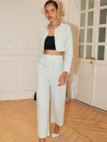 Elevate your work wardrobe with this crisp white suit set that's equal parts polished and fun. The cropped jacket hits just right for a modern silhouette, while the straight-leg pants offer timeless comfort and versatility. Whether you're heading to the office or stepping out for weekend plans, this two-piece combo works overtime. Pair it with your favorite heels, sneakers, or flats—this suit plays well with everything. Clean lines, confident vibes, and zero fuss required.