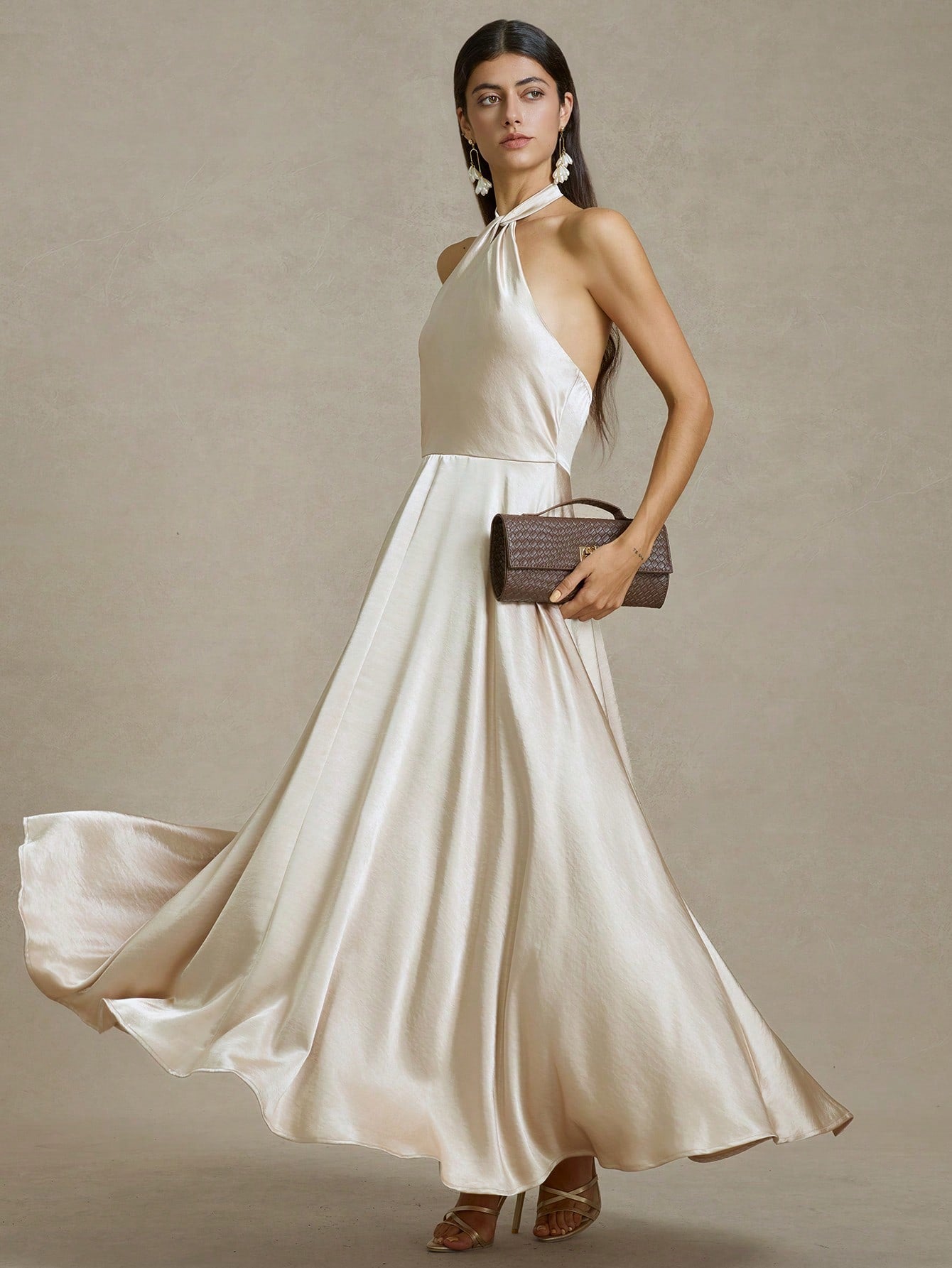Step into sunshine and style with this Chic Woven Backless Maxi Dress. Its breezy, backless design keeps you cool while turning heads wherever you go. Perfect for summer days or vacation escapes, this dress combines comfort and flair for effortless, playful elegance.