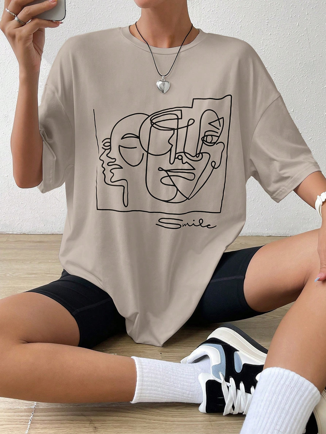 Introducing the Chic Y2K Abstract Figure Graphic Drop Shoulder Tee, the perfect addition to your summer wardrobe. With a stylish and effortless design, this tee features an abstract figure graphic that adds a touch of sophistication to any outfit. Its drop shoulder design provides a comfortable and relaxed fit, making it the ideal choice for all-day wear. Elevate your summer style with this chic and trendy tee.