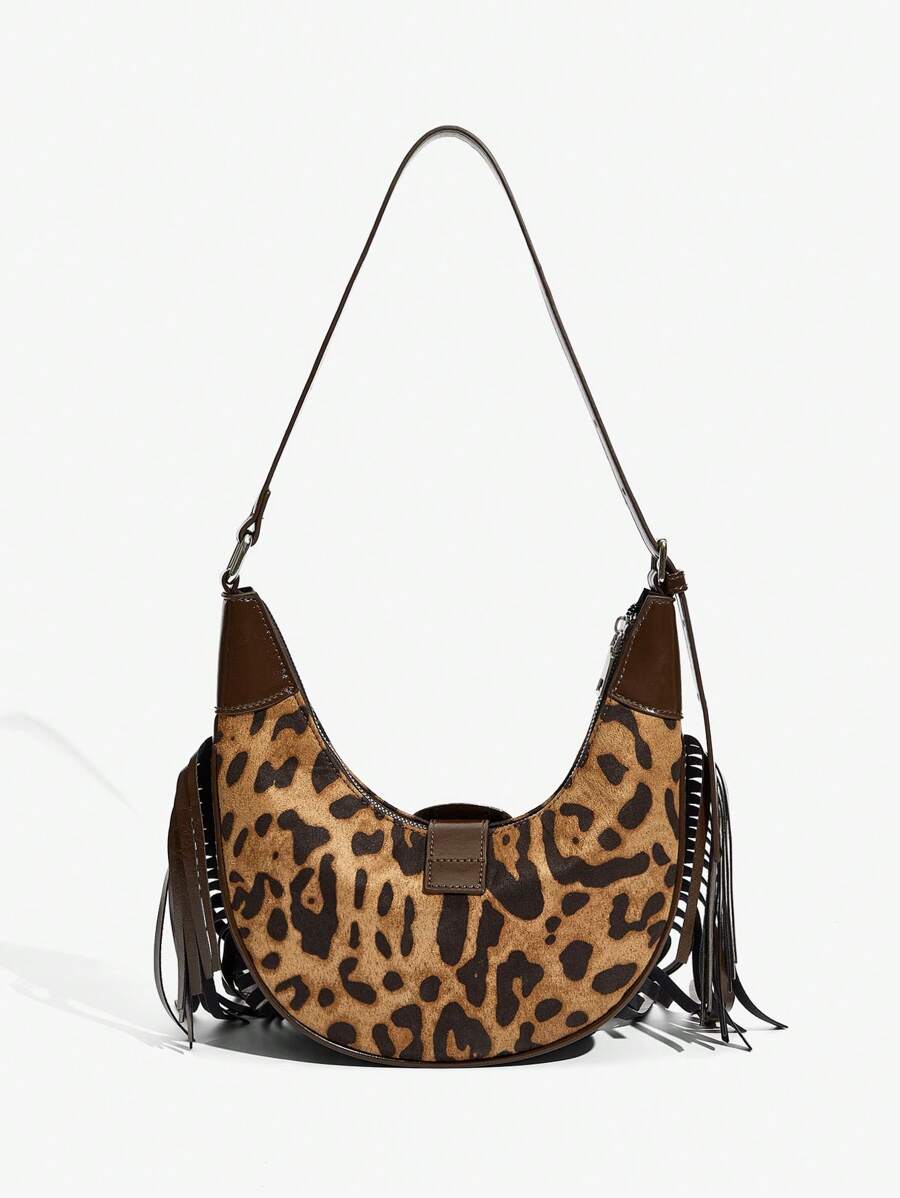 Step out in style with this Chic Y2K Cow Print Hobo Bag, perfect for trendy girls who love vintage vibes. The playful cow print paired with rivet detailing and fun tassels adds a trendy, retro flair to any outfit. Lightweight and roomy, it’s ideal for carrying your essentials while turning heads wherever you go. Embrace the perfect mix of edgy and cute with this unforgettable accessory.