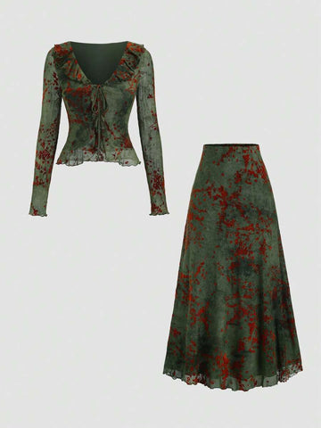 Front view of moss green mesh top and floral ruffle hem skirt set