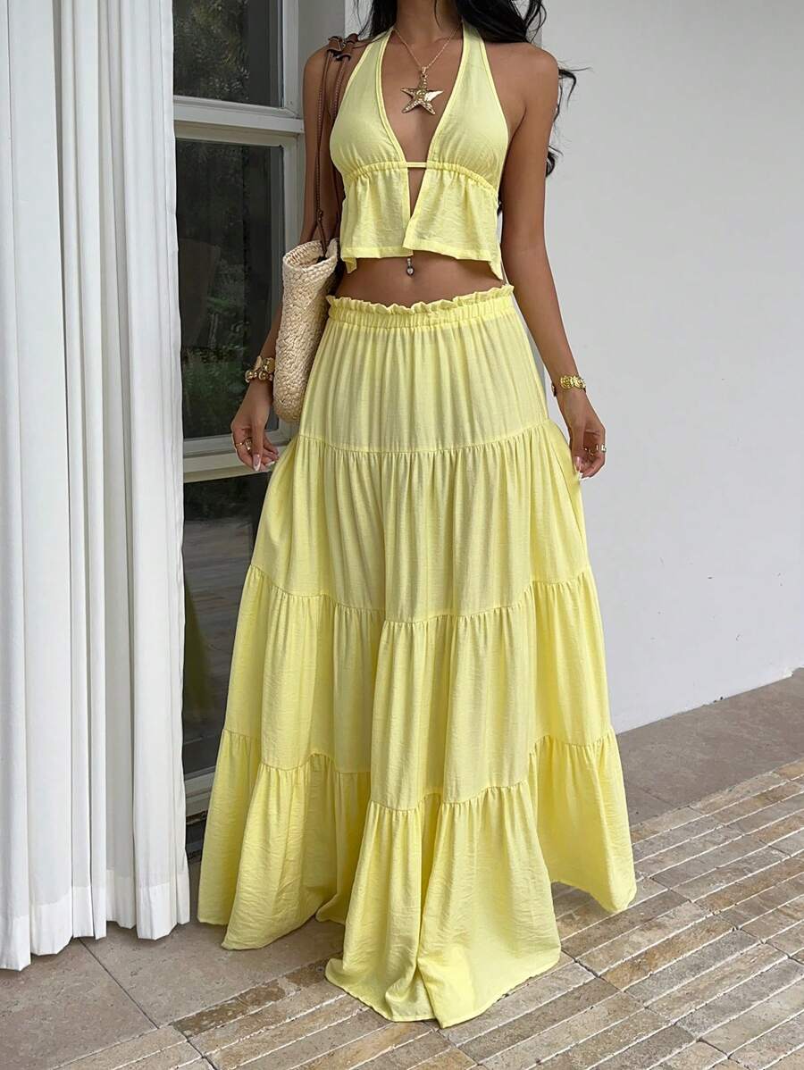 Exude Sun-Drenched Sophistication in Our Chic Yellow Linen 2-Piece Set!

Experience the breathtaking fusion of coastal heritage and sharp, modern architectural tailoring. This stunning yellow linen ensemble is meticulously designed for the woman who values a high-fashion, "quiet luxury" approach to resort wear—the ultimate centerpiece for prestigious beachside brunches, exclusive tropical retreats, and high-authority summer social gatherings.

Iconic Halter Artistry: Featuring a masterfully curated deep V-n