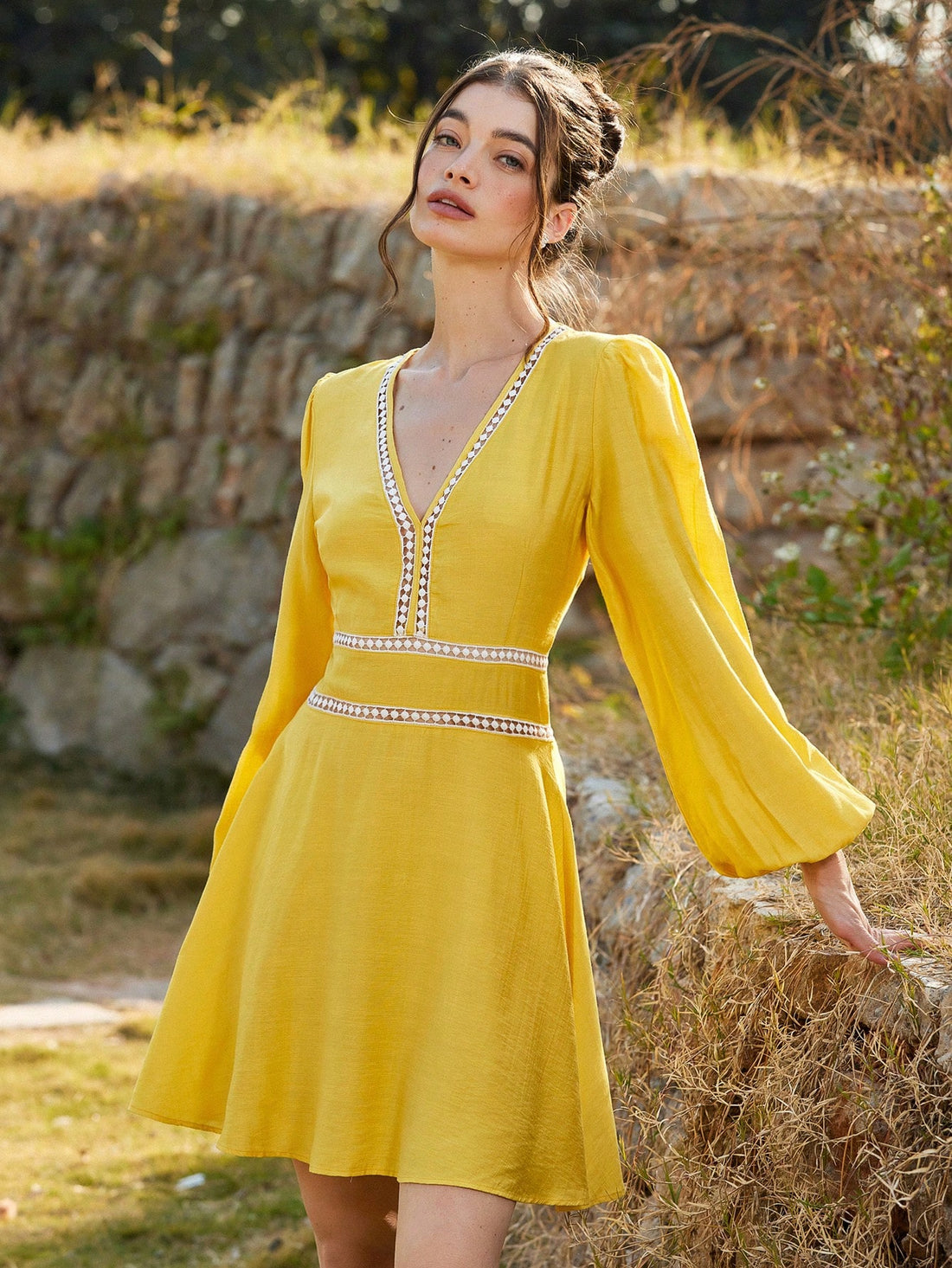 Brighten up your spring/summer wardrobe with our Chic Yellow Mini Dress! Made with textured woven floral lace, this dress exudes elegance while still being fun and playful. Perfect for any occasion, this dress is sure to make a statement. (Floral arrangements not included.)