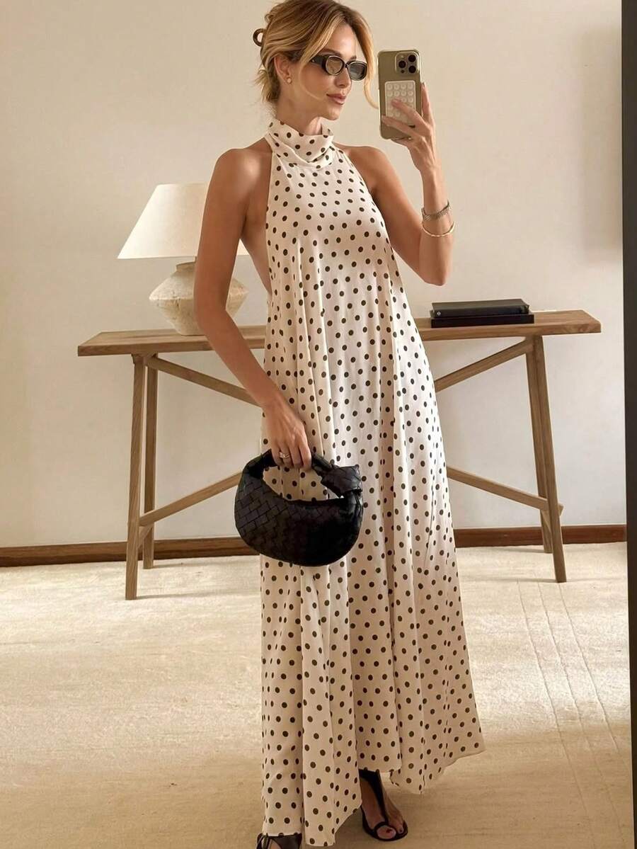 Brighten your summer wardrobe with this charming yellow polka dot sleeveless dress. The lightweight, breathable fabric keeps you cool and comfortable through warm days, while the classic polka dot pattern adds playful sophistication to any occasion. Perfect for beach getaways, casual brunches, or laid-back evenings, this dress transitions effortlessly from day to night. The sleeveless design offers freedom of movement, and the relaxed silhouette flatters all body types.