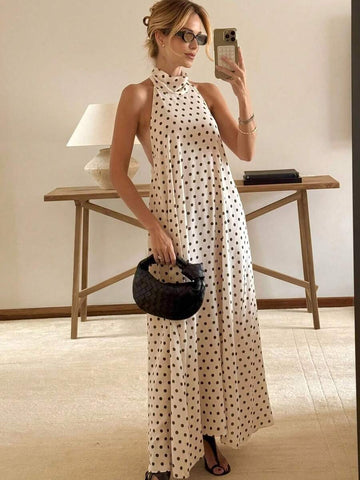 Brighten your summer wardrobe with this charming yellow polka dot sleeveless dress. The lightweight, breathable fabric keeps you cool and comfortable through warm days, while the classic polka dot pattern adds playful sophistication to any occasion. Perfect for beach getaways, casual brunches, or laid-back evenings, this dress transitions effortlessly from day to night. The sleeveless design offers freedom of movement, and the relaxed silhouette flatters all body types.