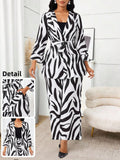 Make a bold statement with this eye-catching zebra print 2-piece set! Featuring a relaxed-fit top paired with comfortable matching pants, this dynamic duo brings instant personality to your everyday wardrobe. The striking black-and-white pattern works effortlessly for casual outings, weekend hangouts, or whenever you want to add a touch of wild style. Mix, match, or wear together—this versatile set gives you endless outfit possibilities with minimal effort. Perfect for fashion lovers who refuse to blend in!