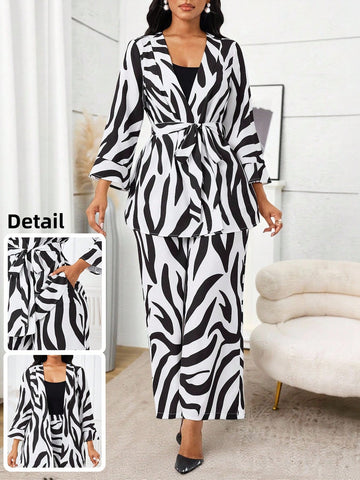 Make a bold statement with this eye-catching zebra print 2-piece set! Featuring a relaxed-fit top paired with comfortable matching pants, this dynamic duo brings instant personality to your everyday wardrobe. The striking black-and-white pattern works effortlessly for casual outings, weekend hangouts, or whenever you want to add a touch of wild style. Mix, match, or wear together—this versatile set gives you endless outfit possibilities with minimal effort. Perfect for fashion lovers who refuse to blend in!