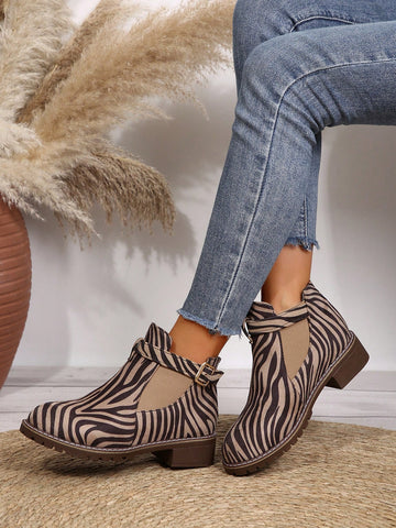 Introducing our Chic Zebra Print Chunky Low Heel Boots - the perfect versatile fashion choice for the autumn and winter seasons. These boots are not only stylish with their trendy zebra print design, but also comfortable with a low heel and perfect for any occasion. Upgrade your shoe collection with these must-have boots.