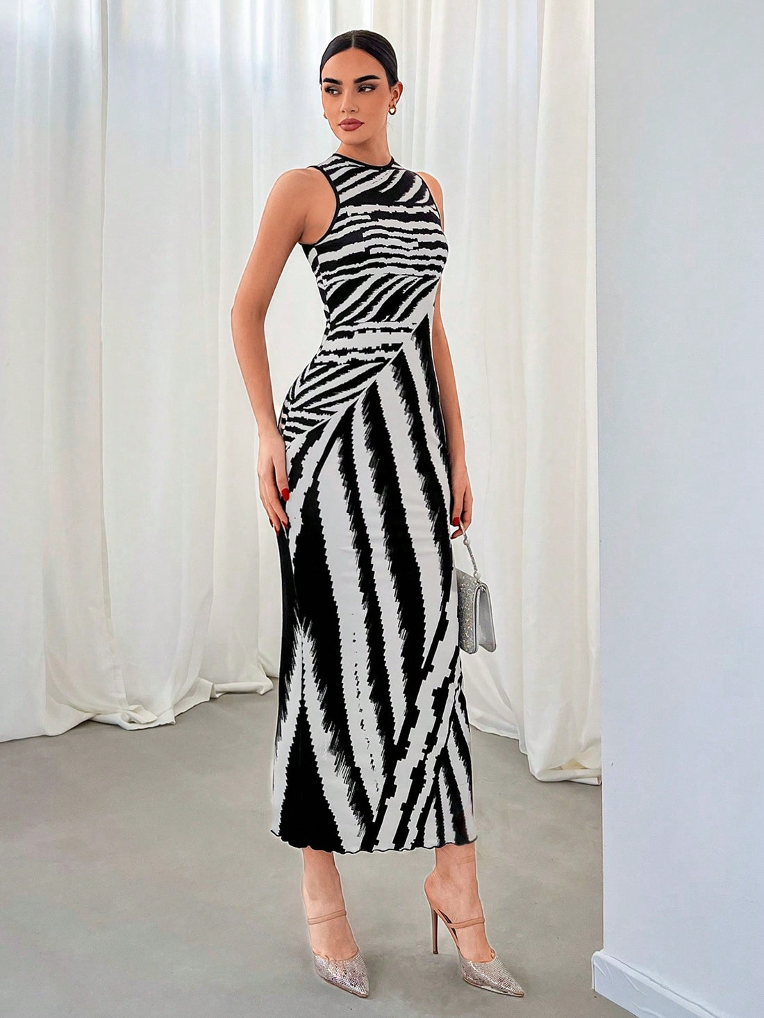 Elevate your work wardrobe with our chic zebra print sleeveless dress. Effortlessly stylish, this dress will make your morning commute a breeze. Made with high-quality materials, it offers both comfort and sophistication. Perfect for the modern professional who wants to make a statement.