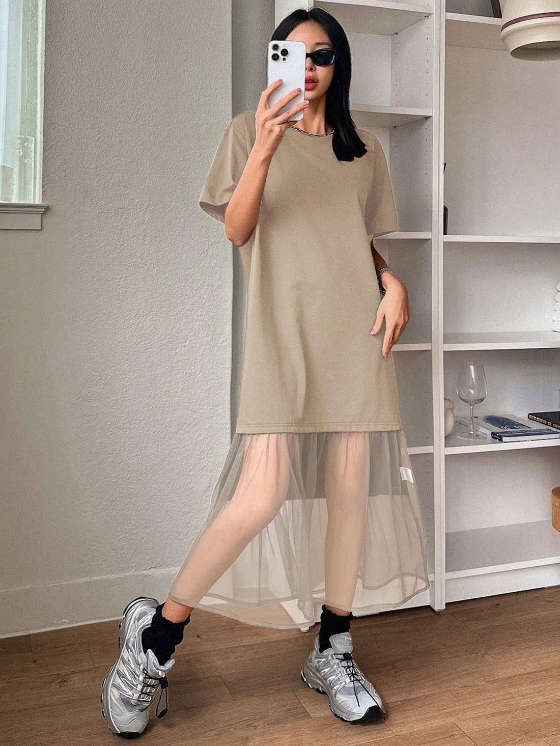 Effortlessly elevate your style with our Chic and Breezy Mesh Splice T-Shirt Dress. The round neck and mesh detailing adds a touch of chic to this breezy dress, perfect for any occasion. Complete the look with this effortless piece for a stylish and comfortable outfit.