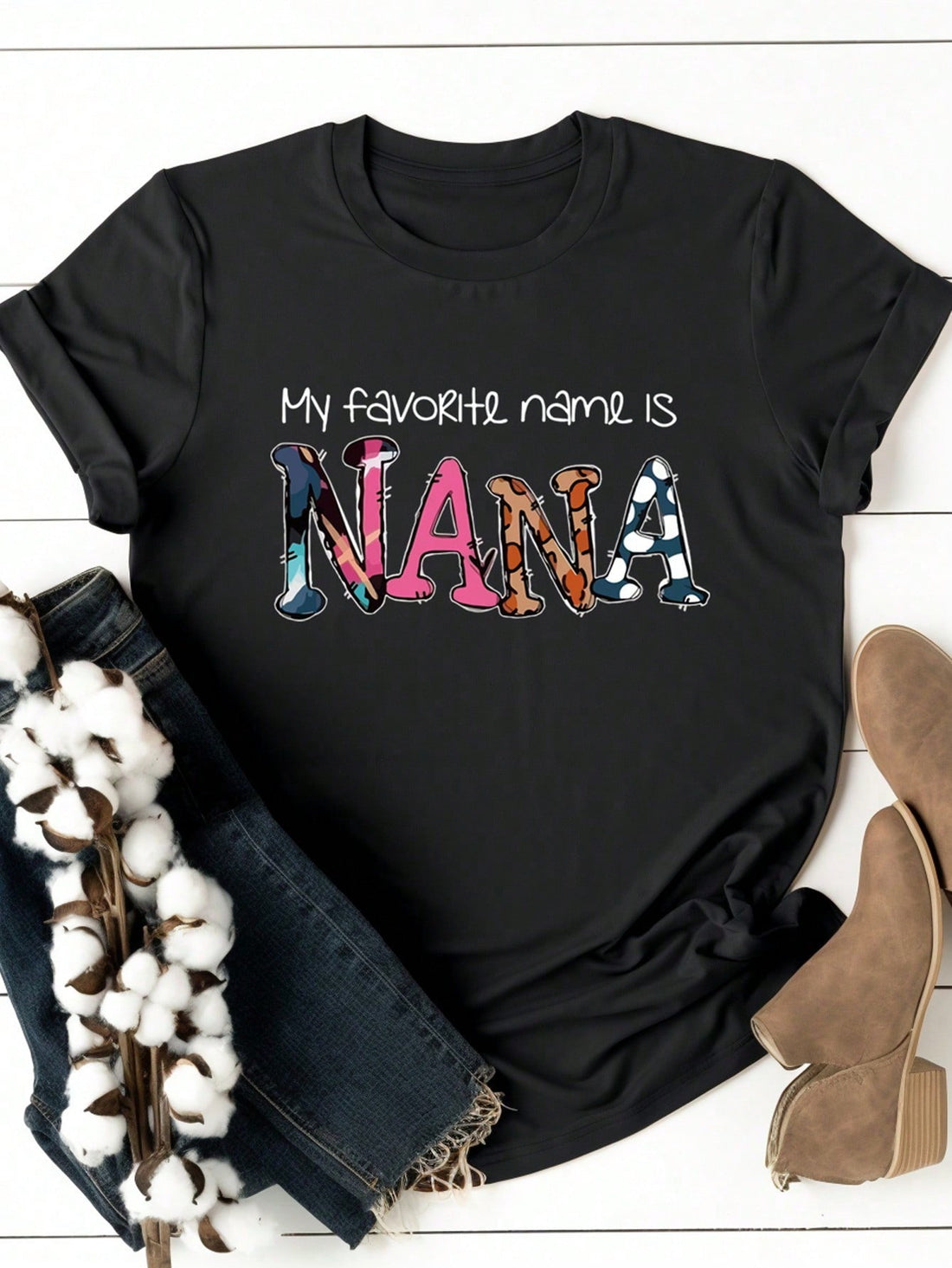This chic and casual Nana print short sleeve t-shirt is a must-have for women. Made with high-quality fabric, it offers both comfort and style for everyday wear. The unique Nana print adds a touch of personality to any outfit. Perfect for adding a playful yet fashionable touch to your wardrobe.