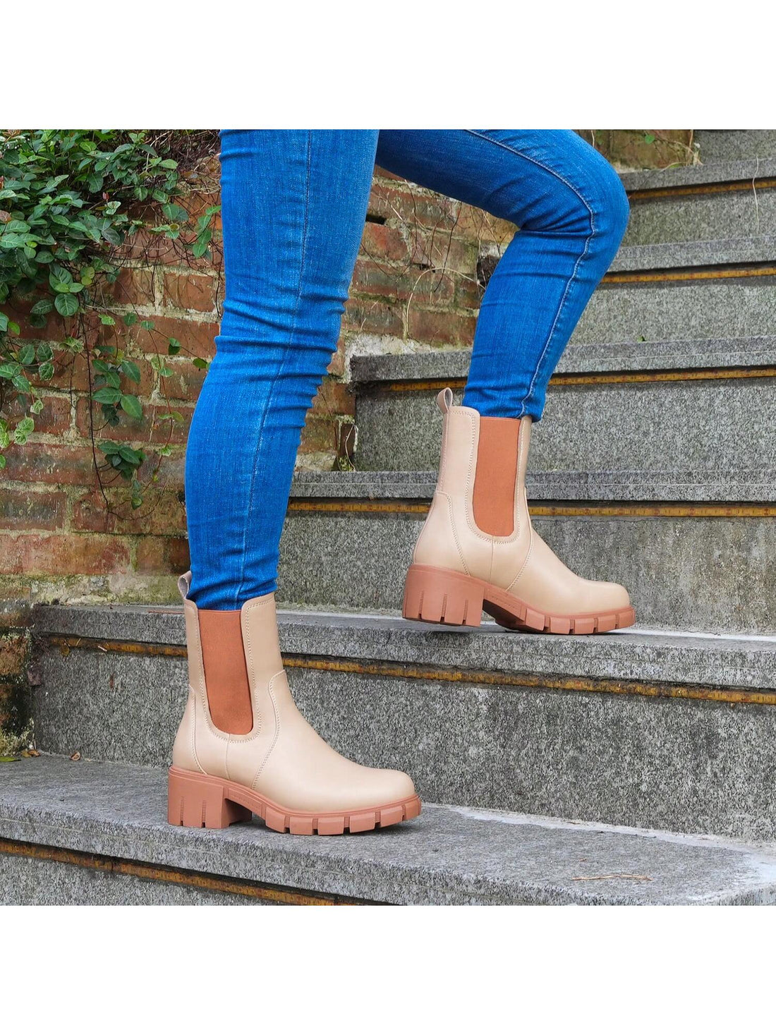 Elevate your style with Chic and Chunky: Women's Platform Chelsea Boots. These trendy boots feature a sleek, elastic block heel for added comfort and support. Perfect for fashion-forward women looking for both style and practicality.