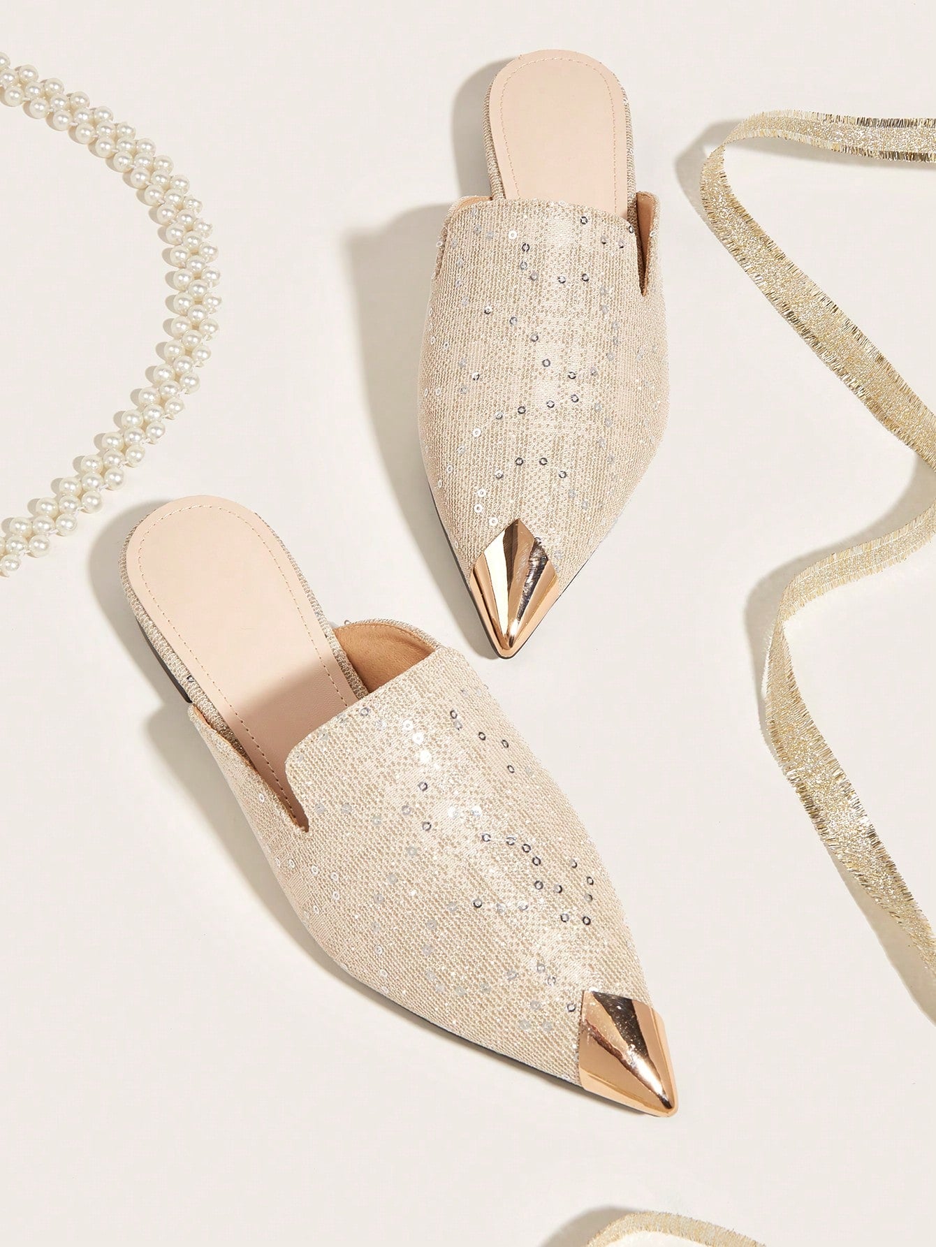 Expertly crafted for women, these chic slide sandals offer unparalleled comfort with their pointed toe and slip-on style. Perfect for any occasion, these sandals are a must-have addition to your wardrobe. Effortlessly stylish and easy to wear, these sandals will elevate your outfit and keep you comfortable all day long.