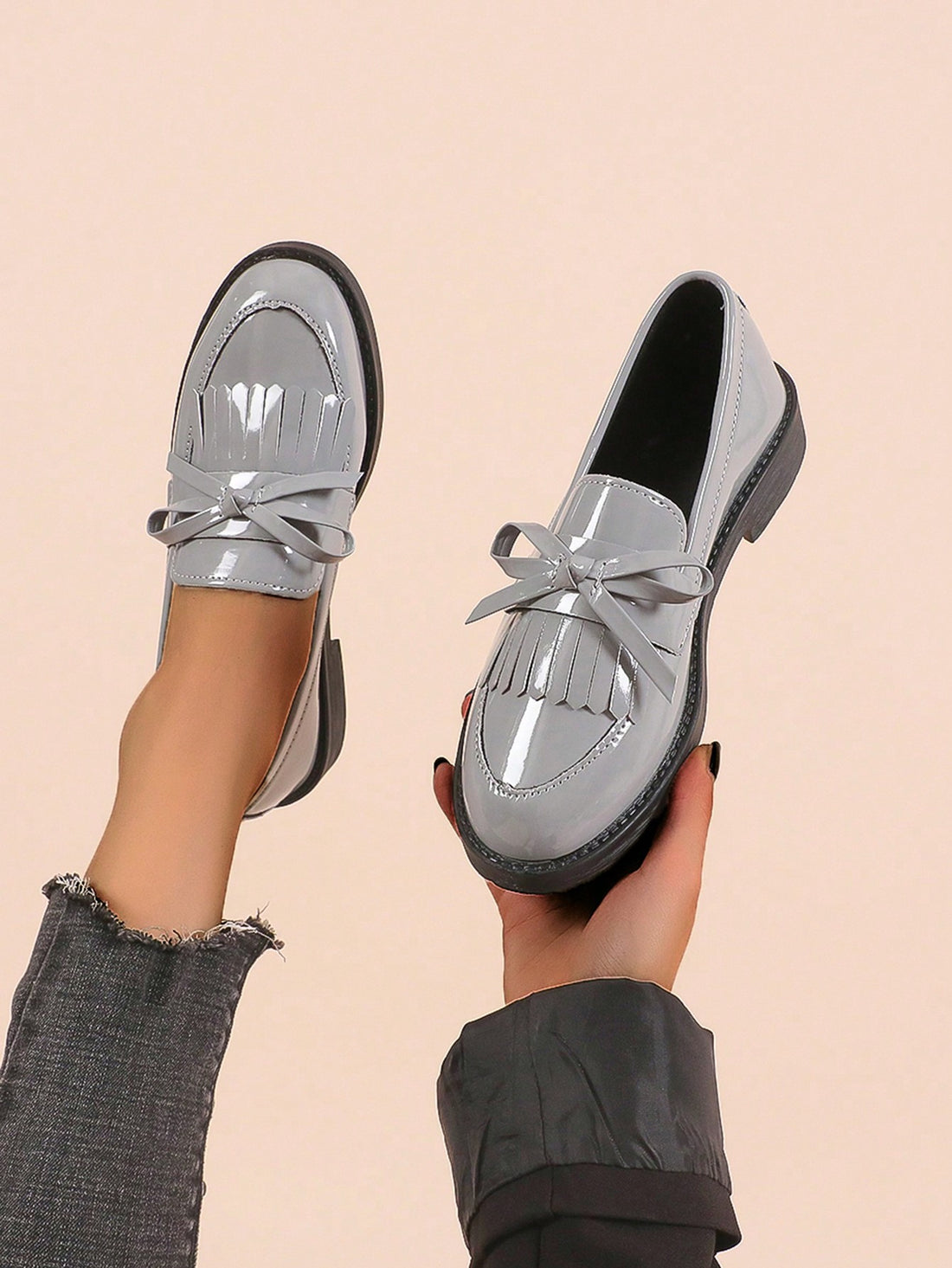 Step into style and comfort with our Chic and Comfortable Women's Gray Bow Knot Slip-On Loafers. These slip-on shoes feature a sophisticated gray color and adorable bow knot detailing, perfect for any occasion. With their comfortable design and elegant look, these loafers are a must-have for any fashion-forward woman.