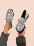 Step into style and comfort with our Chic and Comfortable Women's Gray Bow Knot Slip-On Loafers. These slip-on shoes feature a sophisticated gray color and adorable bow knot detailing, perfect for any occasion. With their comfortable design and elegant look, these loafers are a must-have for any fashion-forward woman.