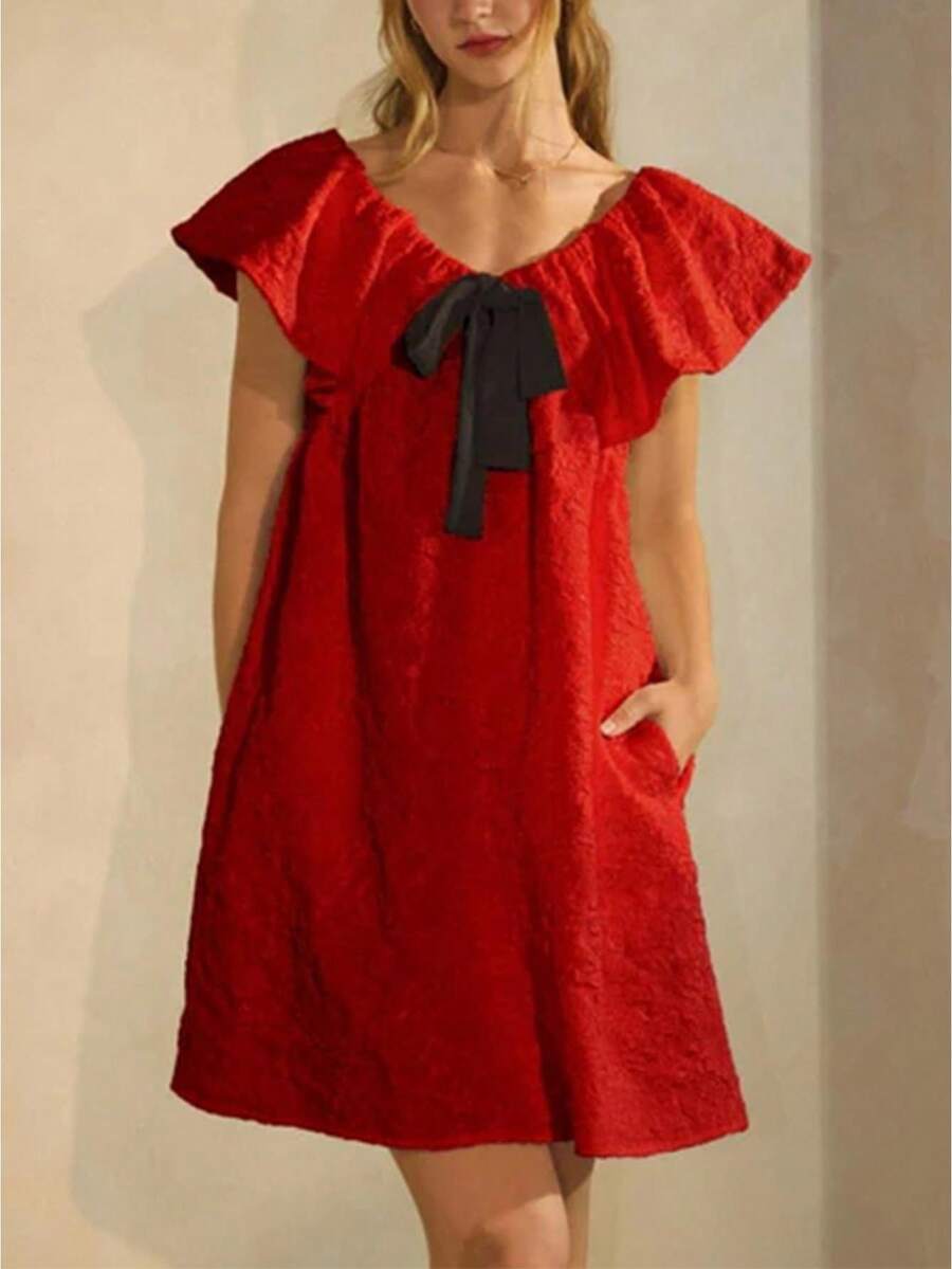 Elevate your casual wardrobe with this charming short sleeve mini dress. Featuring a flattering V-neck design and graceful A-line silhouette, it's crafted from high-stretch fabric for all-day comfort and ease of movement. The textured details and subtle ruffle accents add visual interest, while the natural waistline creates a polished, feminine look. Perfect for dating, casual outings, or festive occasions, this versatile red dress transitions effortlessly from day to night. The regular fit and flared hem p