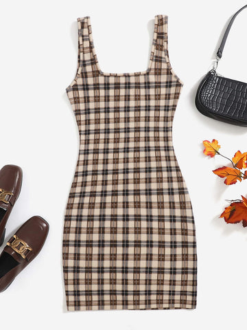 This chic and comfortable dress features a stylish plaid print that will elevate your wardrobe. Made with soft and breathable fabric, it offers both fashion and comfort for any occasion. Stay on trend and comfortable with this versatile cami dress.