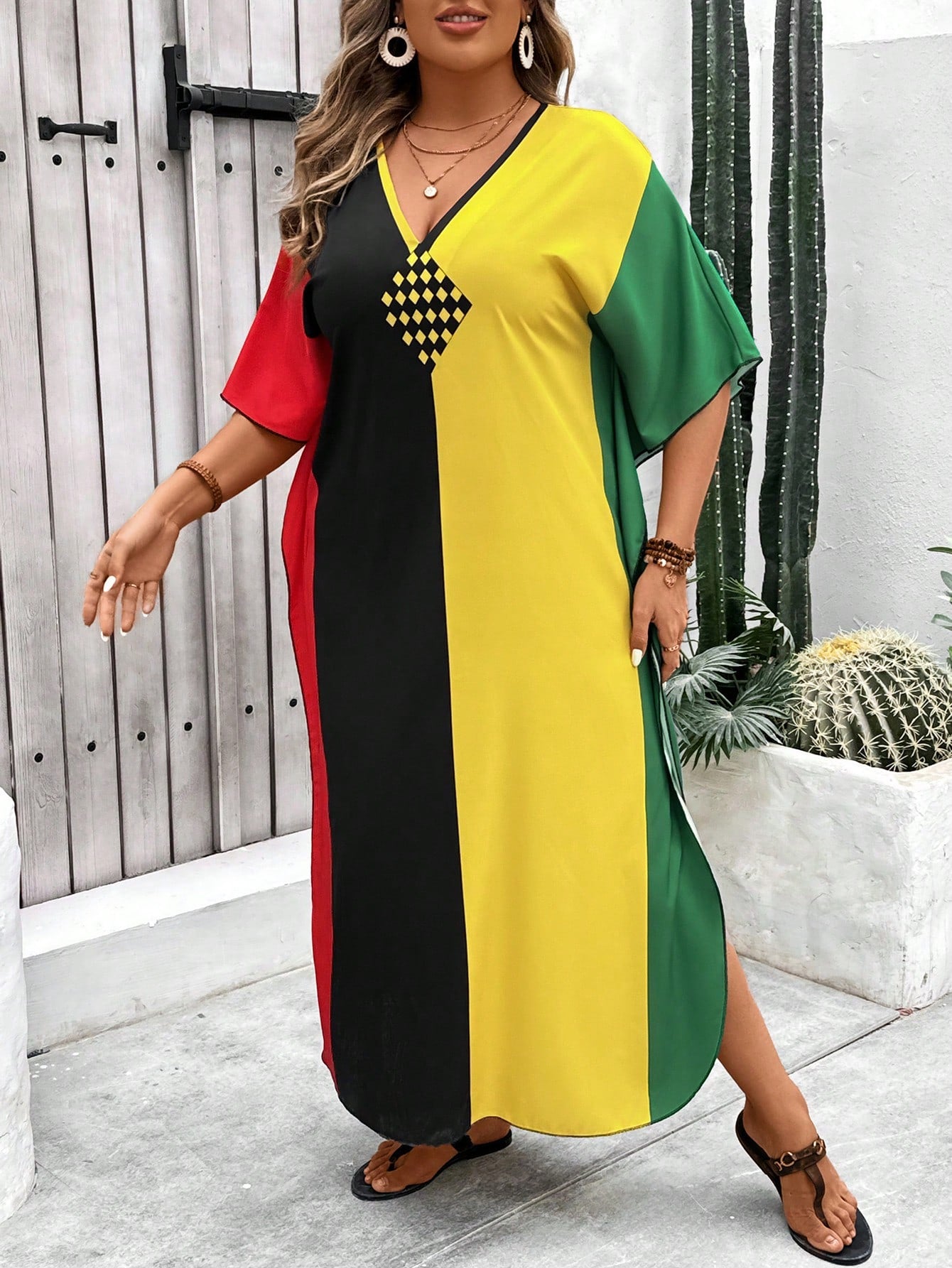 Get ready to turn heads in our Chic and Comfy dress! Perfect for the summer, this plus size dress features a stylish color block design, a flattering V-neck, and trendy batwing sleeves. Stay comfy and cool while looking effortlessly chic. (Size options available.)