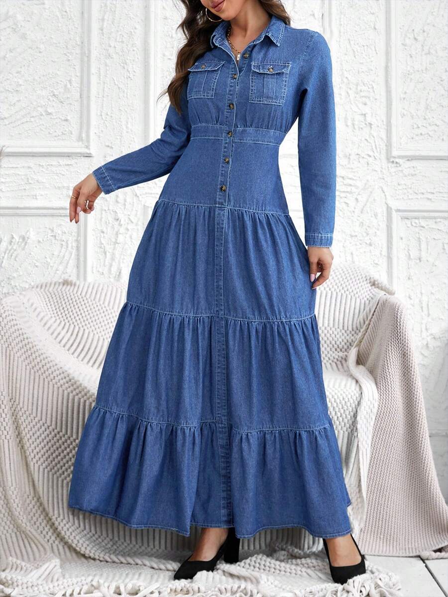 Front view of medium wash denim maxi shirt dress with collar buttons and chest pockets