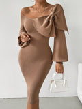 Upgrade your wardrobe with our Chic and Cozy Women's Asymmetrical Neck Bow Sweater Dress. This stylish dress features an asymmetrical neck and a bow detail, creating a chic and elegant look. Made with high-quality material, it's both cozy and comfortable to wear. Elevate your style with this must-have dress.