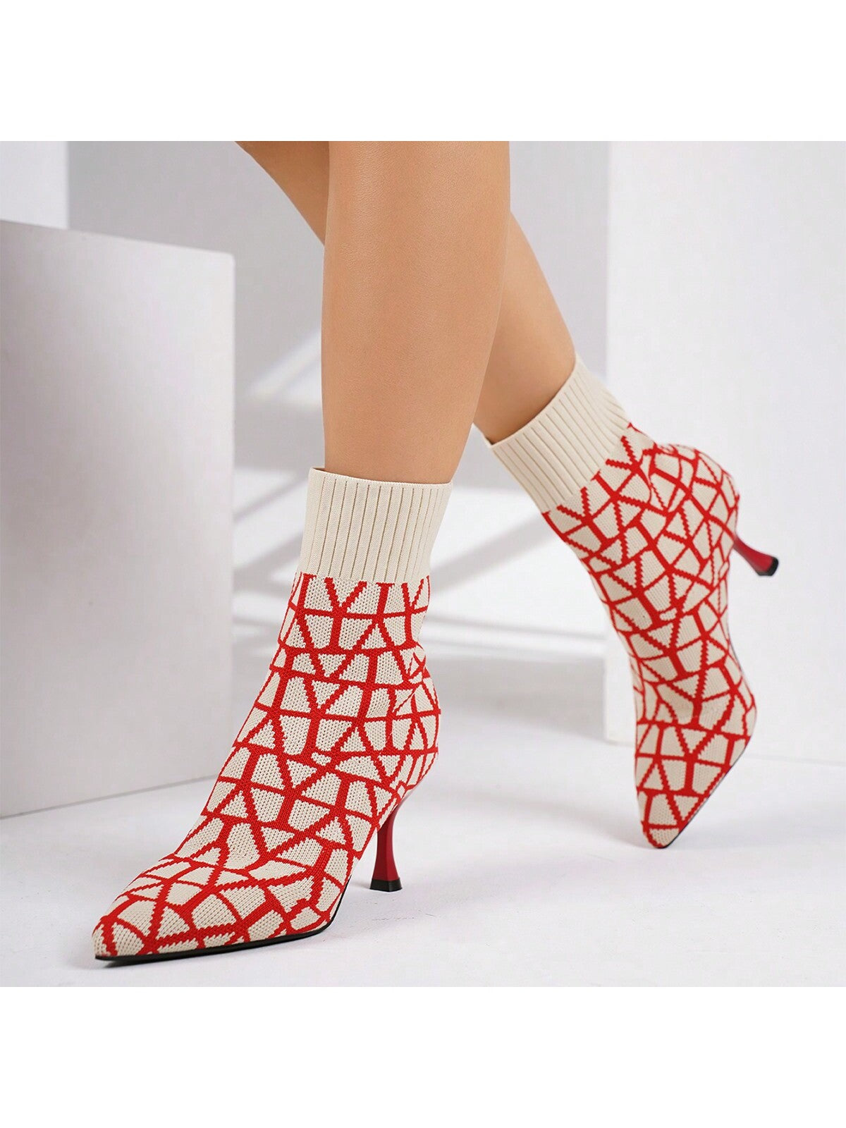 Upgrade your fall and winter style with our Chic and Cozy women's short boots. Featuring a trendy knitted material and a pointed toe design, these boots are the perfect balance of fashion and comfort. Stay stylish and warm in these must-have boots.